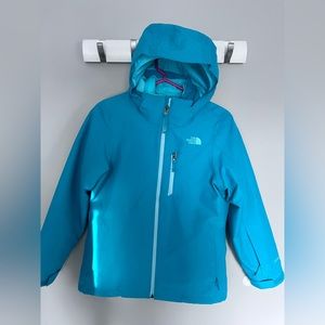 Lightly used girls North Face Jacket. Fleece lining makes it nice and warm.